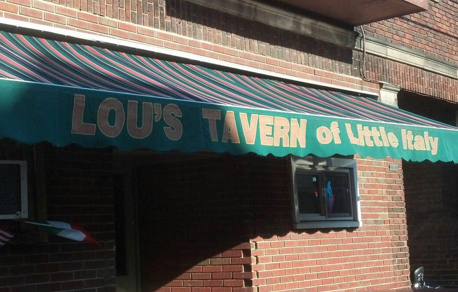 Green striped awning of Lou's Tavern of Little Italy on Coltman Road